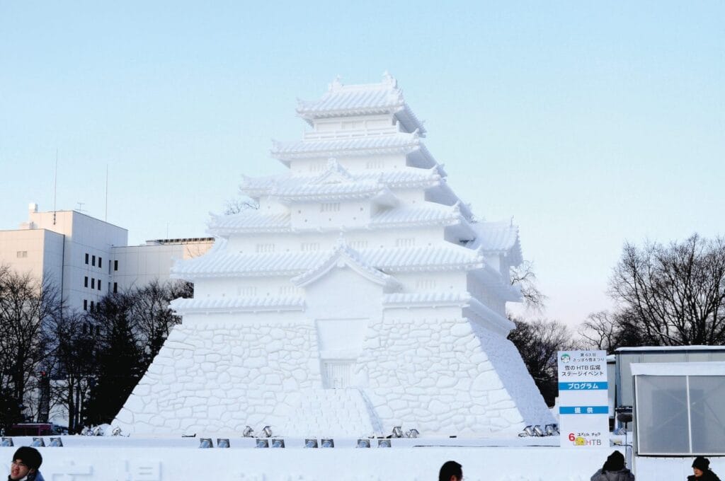 Illuminated snow sculpture at Sapporo Snow Festival in Odori Park, Japan
